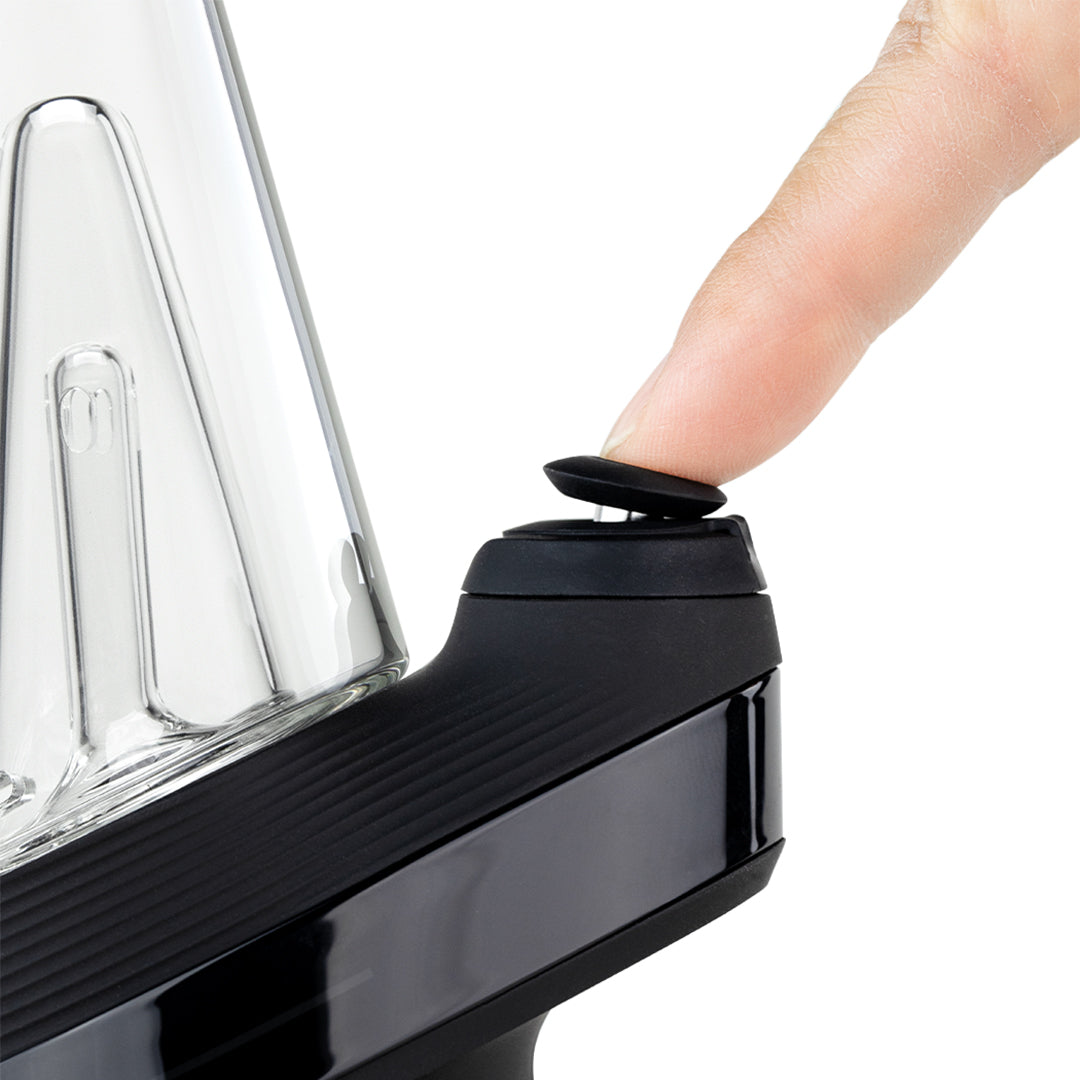 New Puffco Peak updated smart dab rig vaporizer device and packaging on a white background