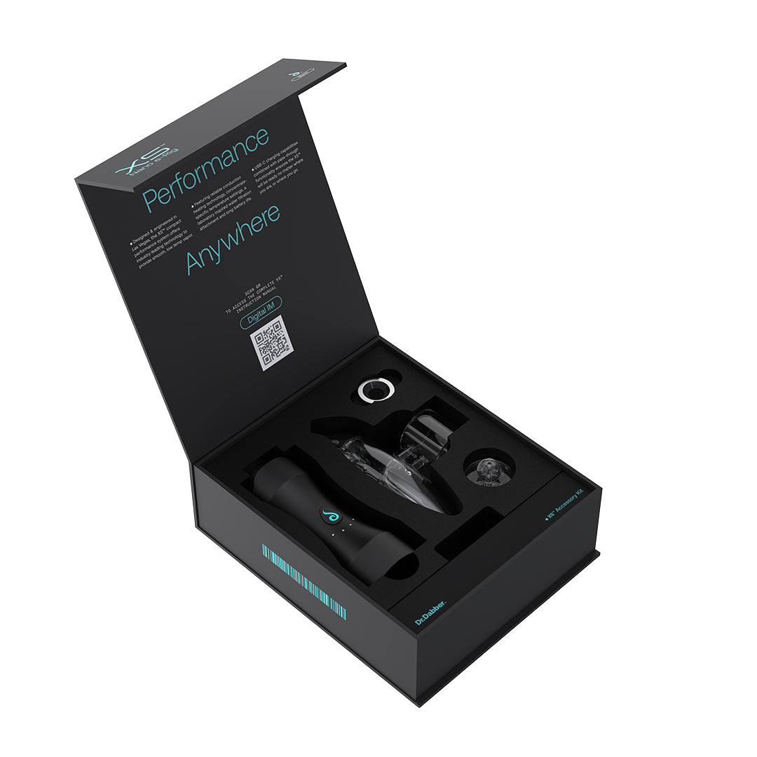 Dr. Dabber XS compact portable electric dab rig device and packaging on a white background


